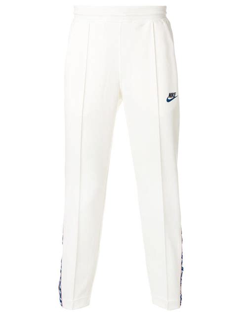 nike pants with white stripe